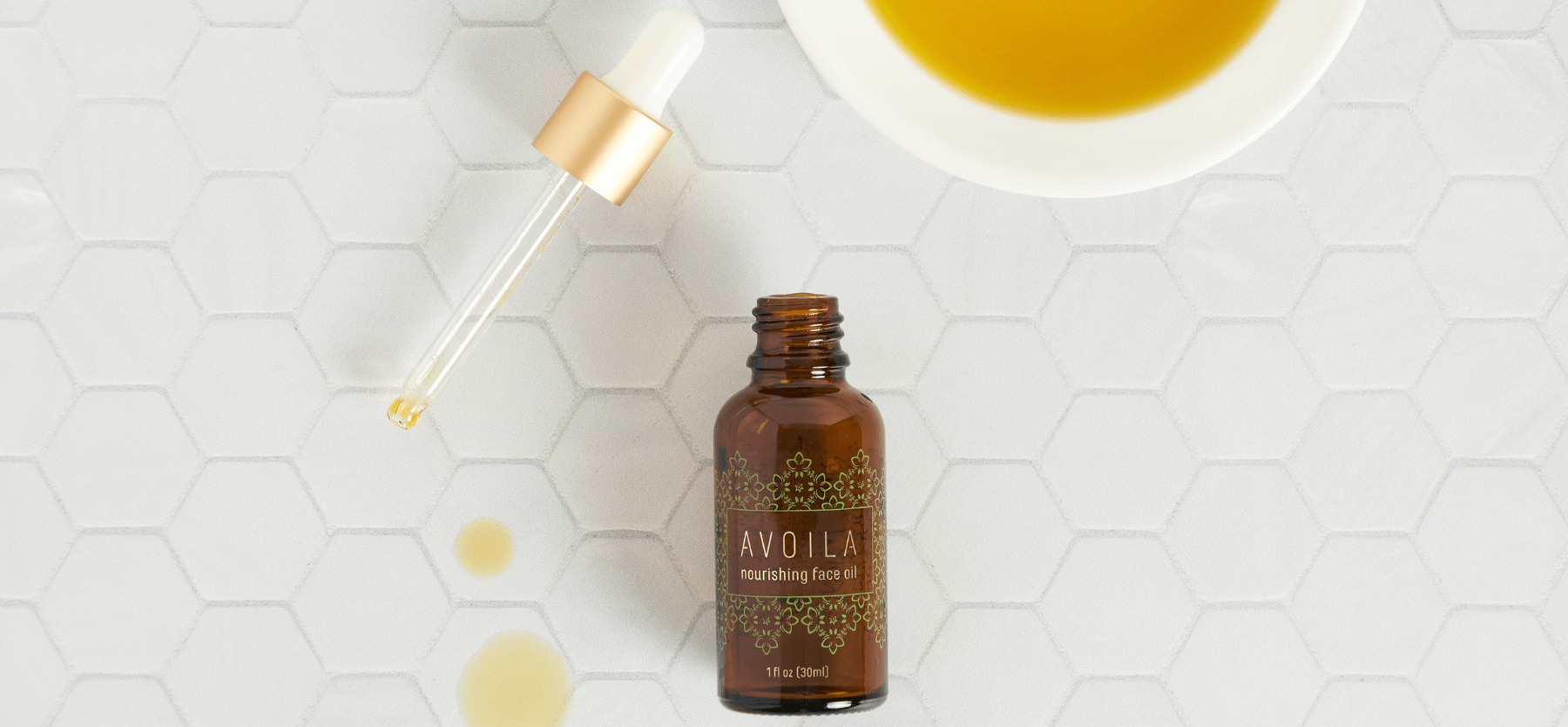 Avoila bottle and oil droplets 
